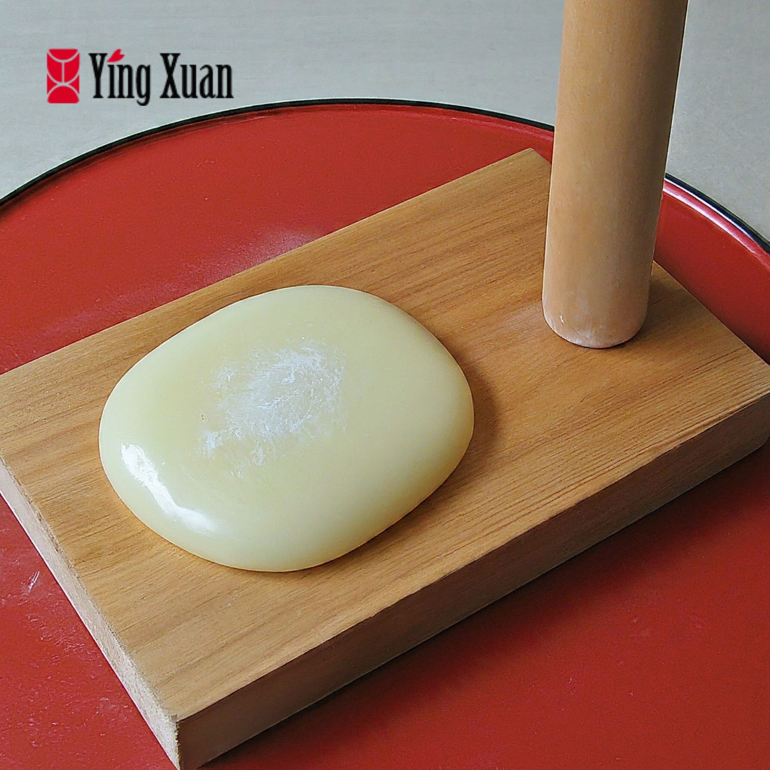 The mochi board and pounding tool used in the process
